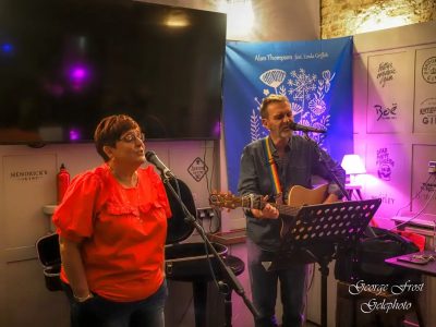 Alan and Linda singing at the Lighted Stage Songwriter Sessions